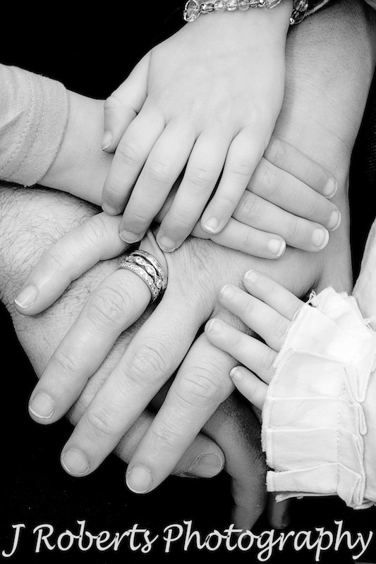 Family of 5 hands together - family portrait photography sydney